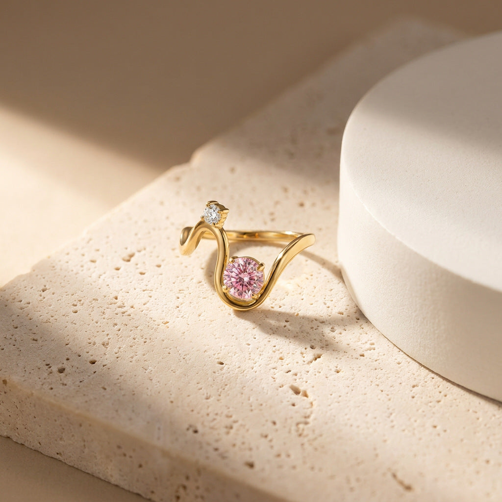 Minimalist Gold Wave Ring with Sparkling Gemstone Accent